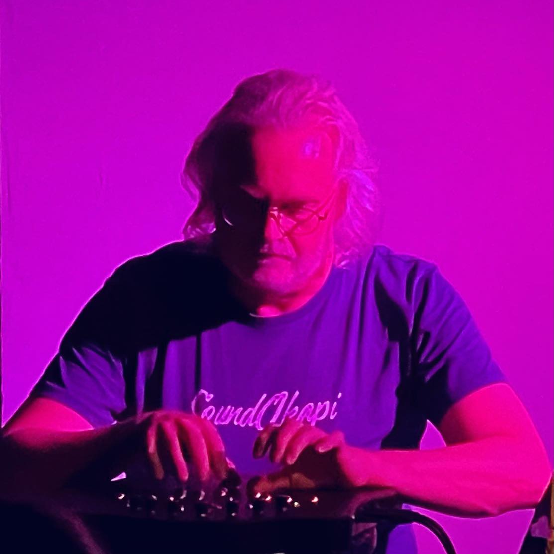 Musician playing synthesizer